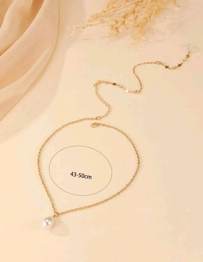 Bijoux de corps - Chaîne de dos perle et étoile- Shinyboheme - Bijoux pour dos nu - Bijoux de robe de mariée - Dos nu robe de mariée - Bijoux pour dos nu - Collier dos nu - Collier de dos - Accessoire robe de mariée - Accesoire bijoux de mariée - Bijoux sexy - Shiny Bohème