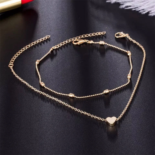 Bracelet de cheville double en acier avec pendentif coeur